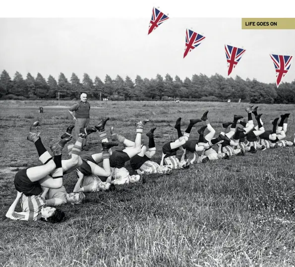  ??  ?? ABOVE The Fairey Aircraft women’s football team train in July 1944 for upcoming matches with ladies of the WAAF and ATS