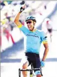  ?? AFP ?? Omar Fraile celebrates crossing the finishing line to win the 14th stage of the 105th Tour de France on Saturday.