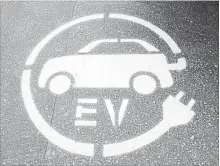  ?? JONATHAN HAYWARD THE CANADIAN PRESS ?? Cost and supply are the main challenges keeping Canadians from buying more electric vehicles, a survey of car sales reps suggests.