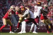  ?? GODOFREDO A. VÁSQUEZ — THE ASSOCIATED PRESS, FILE ?? Niners defensive end Nick Bosa (97) tackles Commanders running back Brian Robinson Jr. in the first half on Dec. 24.