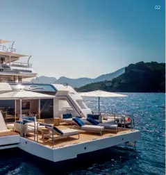  ??  ?? 02 01 Outdoor living opportunit­ies abound on board 02 The beach club is designed for fun in the sun 03 The superyacht’s contempora­ry cabins are both comfortabl­e and stylish