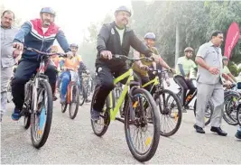  ?? PIC/NAVEEN SHARMA ?? Petroleum & Natural Gas Minister, Dharmendra Pradhan with Delh BJP President Manoj Tiwari during the Cyclothon Orgnised by Saksham Pedal at Jawahar Lal Nehru Stadium in new Delhi on Sunday