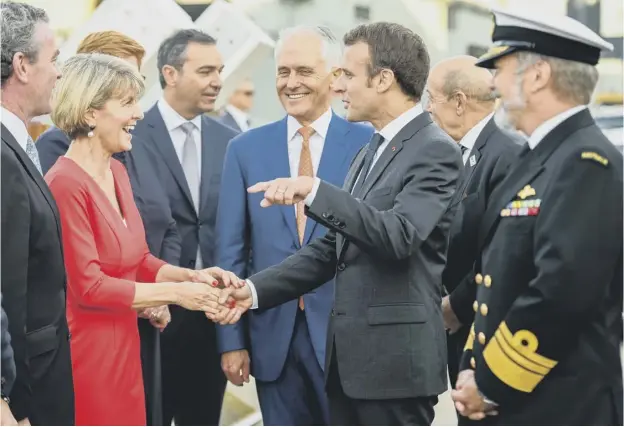  ??  ?? 0 Australian prime minister Malcolm Turnbull introduces French president Emmanuel Macron to Julie Bishop, Australia’s foreign affairs minister
