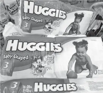  ?? ?? One in every three American families cannot afford enough diapers to keep their infants and toddlers clean, dry and healthy, says the National Diaper Bank Network. TIM BOYLE/GETTY 2005