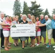  ?? JIM WELLS ?? Willow Park Charity Classic Tournament committee members join executives from the Calgary Counsellin­g Centre, this year’s fundraisin­g recipient, at Willow Park Golf and Country Club on Thursday.
