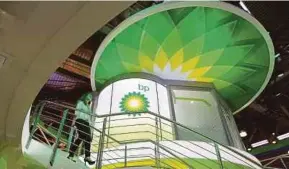  ?? BLOOMBERG PIC ?? BP will start spending as much as US$400 million a quarter to buy back shares issued to partly cover dividend payouts and conserve cash.