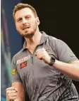  ?? Foto: dpa ?? Bis 2016 noch Handballer, nun Darts‰ Profi: Florian Hempel.