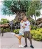  ?? OLGA THOMPSON/WALT DISNEY CO. ?? Hayley and Derek Hough pose near the Tree of Life at Disney’s Animal Kingdom.
