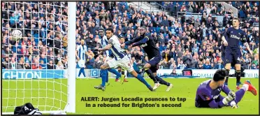  ??  ?? ALERT: Jurgen Locadia pounces to tap in a rebound for Brighton’s second