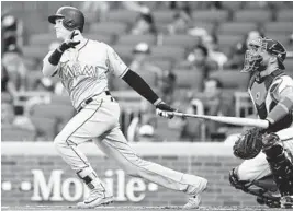  ?? SCOTT CUNNINGHAM/GETTY IMAGES ?? Brian Anderson led National League rookies with 127 hits, 63 runs, 53 RBI and 26 doubles entering Saturday night.