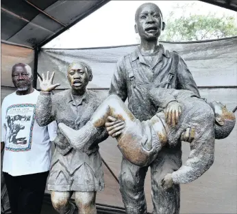  ?? PICTURE: BONGIWE MCHUNU ?? STUDENTS BLEED: Sam Nzima, legendary photograph­er at home in Lilydale, Mpumalanga, was proud when a Zimbabwean artist presented him with this sculpture of a dying Hector Pieterson.