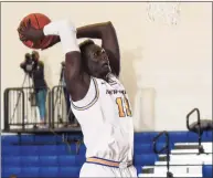 ?? New Haven Athletics / Clarus Multimedia Group ?? Majur Majak, a 7-foot-1 center from South Sudan, has 52 blocks through 17 games and is on pace to break the New Haven single-season record of 75, set by Eric Anderson in 2013-14.
