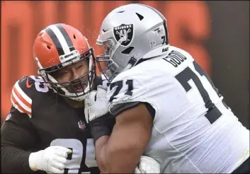  ?? David Richard The Associated Press ?? Raiders veteran Denzelle Good, working against Browns defensive end Myles Garrett, has been needed to fill in because of injuries on the offensive line.