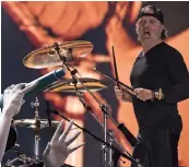  ?? — AFP ?? Lars Ulrich of Metallica (above) performs in a concert during Quebec City Summer Festival on in Quebec City, Canada. Ethiopian-American singer Kelela (left) performs at the festival.