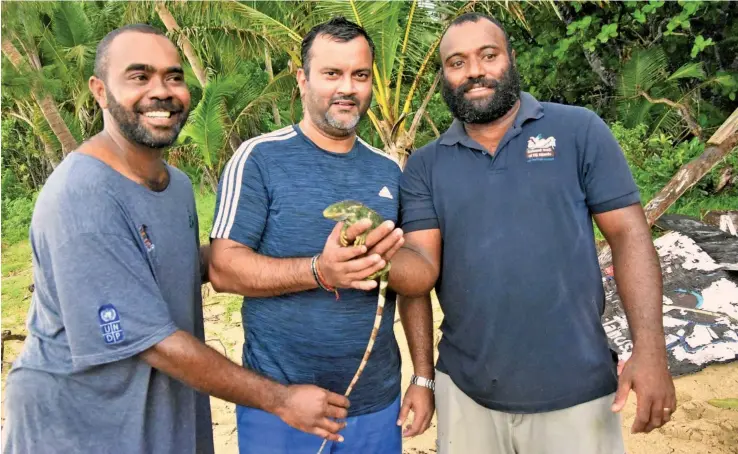  ?? ?? Standing Committee on Justice, Law and Human Rights Chair, Alvick Maharaj (middle), at the Floating Island in Wainikoro in Bua, the home of the crested Fijian Iguanas. On the left is SODELPA MP Mosese Bulitavu.