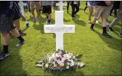  ?? VIRGINIA MAYO / AP ?? Julius Pieper was among 13 men from a Navy ship who were never identified by name and were buried at an American cemetery in Belgium. He was reunited with his twin brother in Normandy on Tuesday.