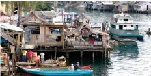  ?? ?? A coastal village in the Bangsamoro province of Basilan in southern Philippine­s. BARMM lawmakers are proposing for the establishm­ent of the Climate Change ComPLVVLRQ WR DGGUHVV WKH WKUHDWV SRVH E\ FOLPDWH FKDQJH WKH VLJQL¿FDQW YDULDWLRQ RI average weather conditions becoming, for example, warmer, wetter, or drier—over several decades or longer. (Photo by Al Jacinto)