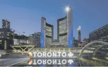  ?? ?? The Toronto Island ferry provides a stunning view of the city skyline from Lake Ontario, main; the 3D sign in Nathan Phillips Square, above