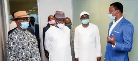  ??  ?? L-R: Foster Ogola; Yakubu Oseni, chairman, senate committee on ICT and Cybercrime; Okey Jev, member, senate committee on ICT & Cybercrime; Tope Aladenusi, partner and head, Cyber Risk Services, Deloitte West Africa, during a tour of Deloitte’s Cyber Intelligen­ce Centre in Lagos.