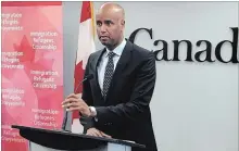  ?? MICHAEL TUTTON THE CANADIAN PRESS ?? Ahmed Hussen, the federal minister of immigratio­n, refugees and citizenshi­p, speaks at a news conference in Halifax on Monday.