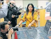  ?? REUTERS ?? A staff of the US Government Publishing Office unpacks new copies of President Donald Trump's Budget.