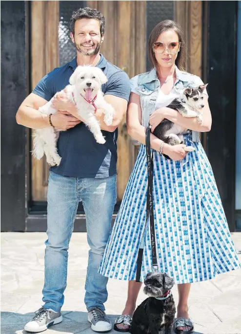  ??  ?? Rob Scheinberg and Danielle Eden-Scheinberg appear in the new series Dog Tales Rescue, which focuses on their work on behalf of abused animals and the Ontario property they’ve opened up to house them.