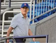  ?? Jeff Roberson/Associated Press ?? New York Mets owner Steve Cohen walks in the stands at Clover Park as he watches his team during spring training practice Monday in Port St. Lucie, Fla.