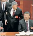  ?? ?? OUSTED: Hu Jintao is pulled from his seat next to China President Xi Jinping (right).