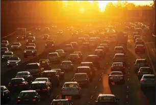  ?? AL SEIB/LOS ANGELES TIMES ?? Morning traffic begins to swell on the 101 Freeway in the San Fernando Valley in March. Gov. Gavin Newsom wants to phase out gas-powered vehicles in the state, with the goal of all cars being zeroemissi­on models by 2035, and trucks by 2045.