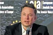  ?? AP PHOTO/CZAREK SOKOLOWSKI ?? Elon Musk speaks
Jan. 22 at the European Jewish Associatio­n’s conference, in Krakow, Poland.