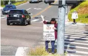  ?? EDUARDO CONTRERAS U-T ?? Kathleen Hedberg, in La Mesa on Tuesday, protests the possible placement of Douglas Badger.