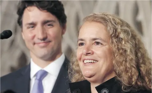  ?? FRED CHARTRAND / THE CANADIAN PRESS FILES ?? Prime Minister Justin Trudeau flanks former astronaut and Governor General designate Julie Payette last week in Ottawa. Trudeau is refusing to say what he knew about a dismissed, non-felony charge against Payette in 2011.