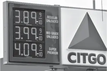  ?? Associated Press ?? ■ In this Feb. 24, 2012, file photo, gas prices are posted at a Citgo gas station in Philadelph­ia. U.S. refiners like Citgo are among the few customers paying cash for Venezuelan crude. Oil shipments to Venezuela’s other big customers, China and Russia, are usually taken as repayment for billions of dollars in debt. So the cash from Citgo has become a lifeline over the past two years as Venezuela’s oil output has plummeted amid chronic underinves­tment in PDVSA and oil prices have dropped from historic highs.