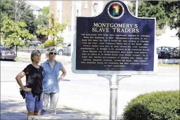  ?? JAY REEVES / ASSOCIATED PRESS 2016 ?? Equal Justice Initiative, which erected this marker about old slave markets in Montgomery, Ala., is this week opening a memorial and accompanyi­ng museum it calls the nation’s first “comprehens­ive memorial dedicated to racial terror lynchings of African...