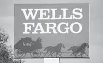  ?? GENE J. PUSKAR AP ?? Wells Fargo is being ordered to pay $3.7 billion in fines and refunds to customers, the largest fine against the bank.