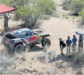  ??  ?? Adiós. Un Red Bull en la última versión del Dakar, en territorio peruano.