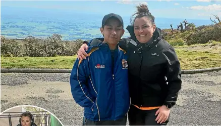  ??  ?? Tracey Hall celebrates with coach Arbie Hong after conquering Wharite Peak at the weekend. She was raising money for Central Districts Multiple Sclerosis. Inset: Hall training at Central Energy Trust Arena for her fundraisin­g walk.