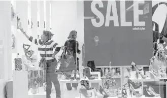  ?? Lynne Sladky / Associated Press file ?? Shoppers look over the selection at a Nine West in Miami in 2011. The New York-based chain filed for bankruptcy protection on Friday.