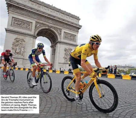  ?? GETTY ?? Geraint Thomas (R) rides past the Arc de Triomphe monument as the peloton reaches Paris after 3,351km of racing. Right: Thomas crosses the line alongside his Sky team-mate Chris Froome