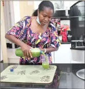  ?? Photos: Paheja Siririka ?? Smoothie maker… Dr Ndume serving aloe vera smoothie she made from the plants in her garden.