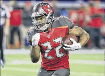  ?? ASSOCIATED PRESS ?? After finishing second in the league with 1,402 yards rushing in 2015, Tampa Bay’s Doug Martin averaged only 2.9 yards per carry in eight games this season.