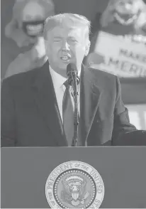  ?? MORRYGASH/AP ?? President Donald Trump speaks at a campaign rally Friday at the Austin Straubel Airport in Green Bay, Wisconsin.