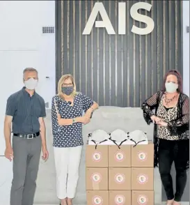  ?? COURTESY ROLLSTONE BANK & TRUST ?? From left, Greg Scher, vice president of Operations at AIS; Lori Kelly, 1st Vice President and Branch Administra­tor at Rollstone Bank & Turst and Elena Goudey, VIP Service Specialist at AIS with face masks donated by AIS ‘Sew The Mask’ campaign earlier this year.