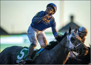  ?? BOBBY ELLIS/GETTY IMAGES ?? Essential Quality, with Louis Saez up, celebrates winning the Breeders Cup Juvenile at Keenland Race Course in Lexington, Kentucky, on Nov. 6, 2020.