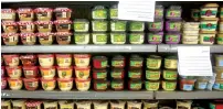  ?? (Marc Israel Sellem/The Jerusalem Post) ?? PROCESSED SALADS, including hummus and tehina, sit on a supermarke­t shelf. These and other food products could someday be marked as healthful by the Health Ministry.