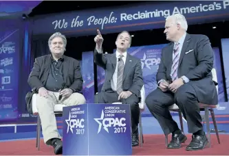  ?? SUSAN WALSH/THE CANADIAN PRESS ?? White House Chief of Staff Reince Priebus, centre, is seen with White House strategist Stephen Bannon, left, and American Conservati­ve Chairman Matt Schlapp, during the Conservati­ve Political Action Conference in Oxon Hill, Md.