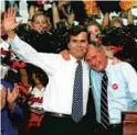  ?? JOE BURBANK/ORLANDO SENTINEL FILE ?? Former President Bush embraces his son Jeb during a campaign rally for Jeb’s first gubernator­ial bid in 1994.
