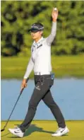  ?? THE ASSOCIATED PRESS ?? South Korea’s Sung Hyun Park reacts after sinking a putt on the 18th green to finish the final round and win the U.S. Women’s Open on Sunday in Bedminster, N.J.