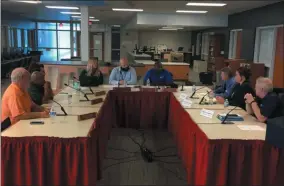  ?? RICHARD PAYERCHIN — THE MORNING JOURNAL ?? Lorain Schools Board of Education members Bill Sturgill, Timothy Williams, Courtney Nazario and Mark Ballard listen to Lorain Law Director Pat Riley advise them on board action needed to retain district Treasurer Joshua Hill under his contract and not allow him to take a new job with the South Euclid Lyndhurst School District.