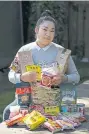  ?? Ruth Fremson, © The New York Times Co. ?? Angelica Garza with her supply of noodles and pasta in uncommon shapes, like lumaconi and calamarata, outside her home in Seattle.